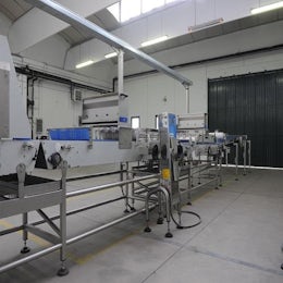 Moulding machine for rolled bread