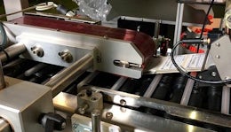 Labeling machine for ampoules